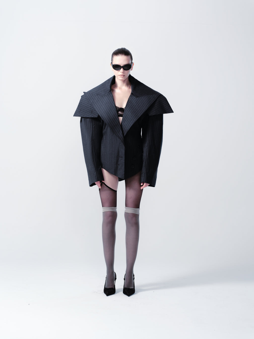 OVERSIZED SCULPTURAL CHEST REVEAL JACKET IN STRIPED SUIT