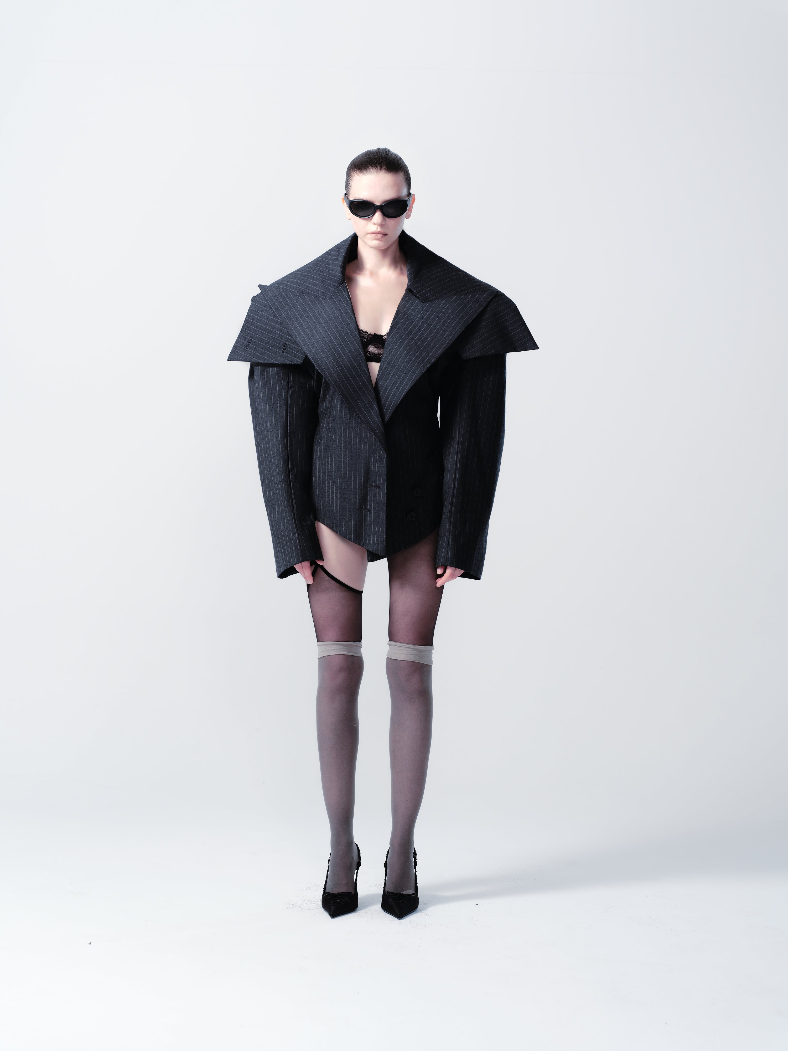 OVERSIZED SCULPTURAL CHEST REVEAL JACKET IN STRIPED SUIT