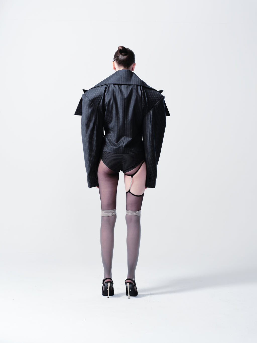 STRIPED SUIT BRIEFS WITH EYELETS AND LOCK